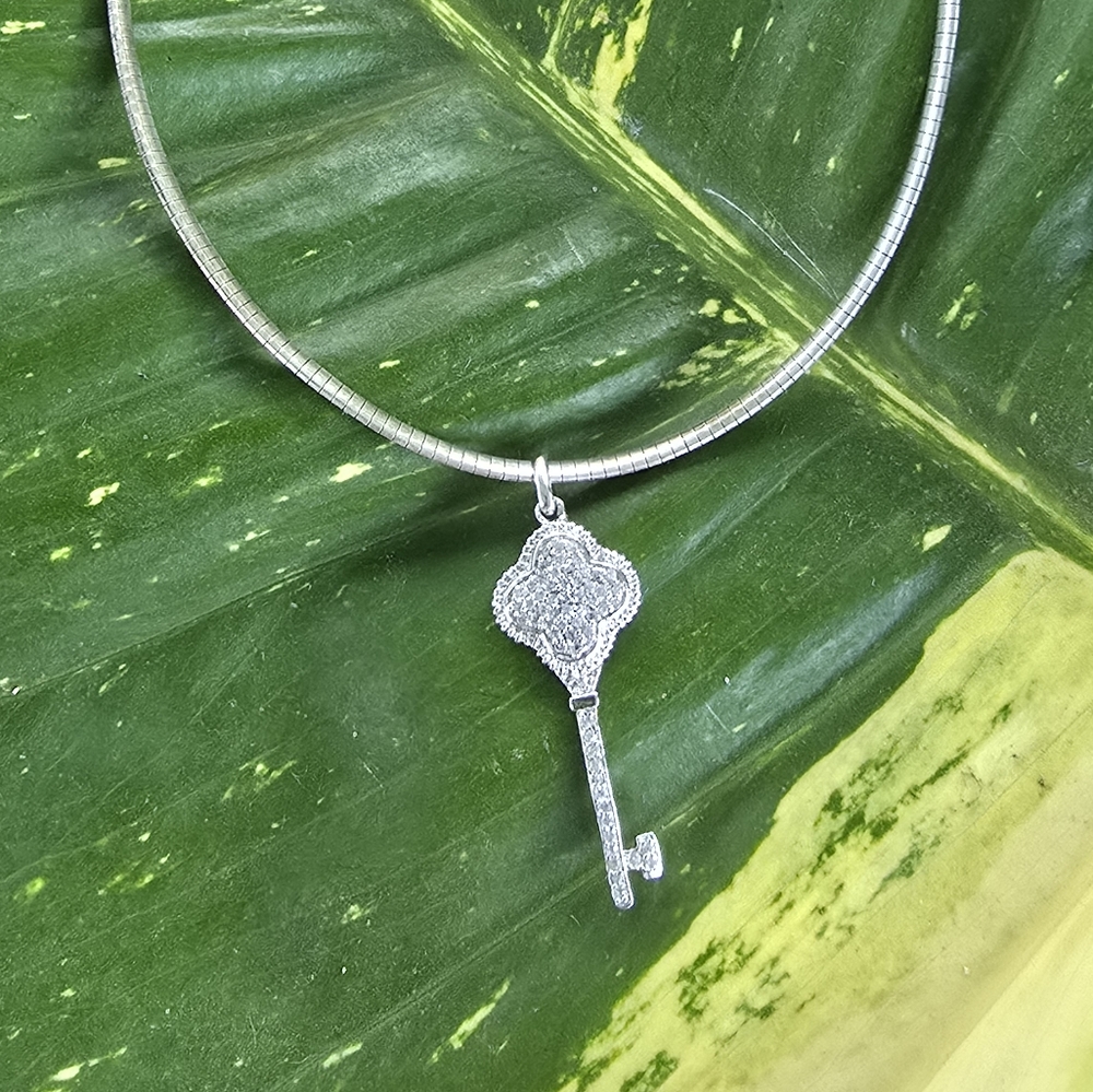 White Sapphire And Sterling Key Pendant